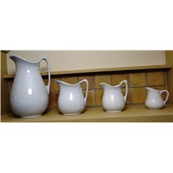 4 Ironstone pitchers, 4" to12", not matching