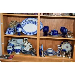 Two shelf lot of collectibles including several pieces of Flow blue, Imari candlesticks, Staffordshi