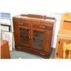 Image 1 : Waterfall style walnut sideboard with two glazed display doors and four drawers including one fitted