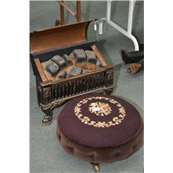 Vintage electric faux fire with glass embers and a small needlepoint upholstered stool