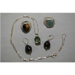 Selection of sterling and silver jewellery including sterling ring set with tiger's eye, sterling bo