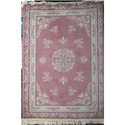 100% wool area rug with cherry blossom border, center medallions in shades of soft rose with blue an