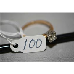 Ladies 14kt yellow and white gold diamond ring set with single 0.34ct solitaire diamond. Retail repl