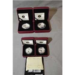 Four Royal Canadian mint "Titanic" coins including two $10 fine silver coins and two 50 cent silver-