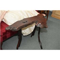 Handcrafted wooden coffee table with willow supports