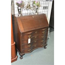 Mid 20th century serpentine front mahogany drop front secretaire with fitted interior and ball and c