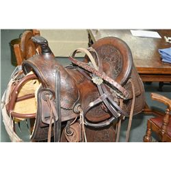 Antique highback western saddle with show bridle and reigns