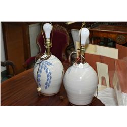 Two vintage glazed pottery table lamps with harps