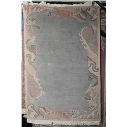 Sculpted wool area rug in shades of mauve, soft and teal, 48" X 72"