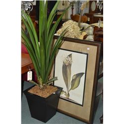 Two pieces of modern decor including and artificial potted plant and a framed botanical print