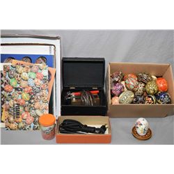 Selection of Ukranian egg decorating supplies (Pysanky) including electric wax pens, instruction boo