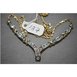 Ladies 10-14kt white and yellow gold necklace set with 1.00ct of brilliant white diamonds. Retail re