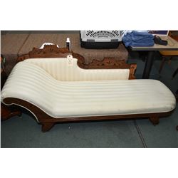 Antique Eastlake oak framed upholstered chaise lounge