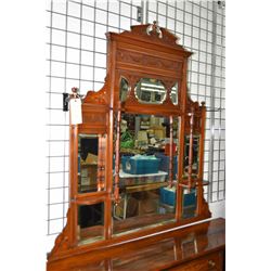 Antique walnut overmantle with carved and turned decoration and eight bevelled mirrors