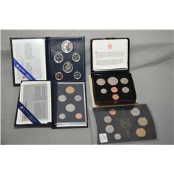 Four boxed Canadian collectible coin sets including uncirculated 1976 set, 1985 specimen set, 1996 s