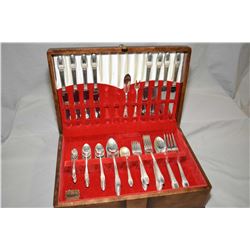 Walnut canteen containing a Rogers Bros. "First Love" silver-plate flatware including eight of dinne