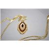 Image 1 : Ladies 14kt yellow gold pendant with marquise shaped cluster, set with 1.44cts of Almandite garnets 
