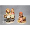 Image 1 : Two Goebel Hummel figures including "Daddy's Girls" and girl feeding chicks with full bee mark