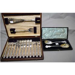 Boxed silverplate and heavily engraved fish knife set with servers and six fish knives and forks plu