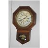 Image 1 : Antique oak cased wall clock made by Wm. L. Gilbert Clock Co. with calendar and decorative visible p