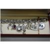 Image 3 : Sterling silver charm bracelet with twelve charms