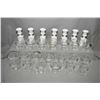 Image 2 : Twenty glass table vases/candleholders plus seven glassed pottery vases, a large three branch candle
