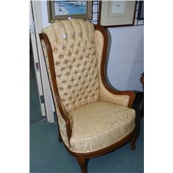 Vintage tall wingback chair with button tufted gold upholstery