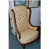 Image 1 : Vintage tall wingback chair with button tufted gold upholstery