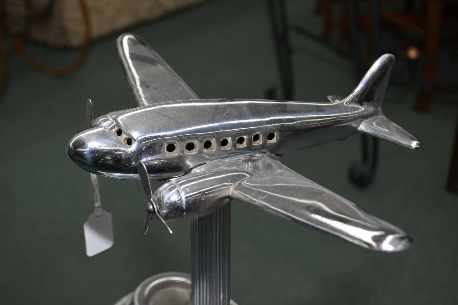 Vintage chrome plated DC3 airplane ashtray with accessories note