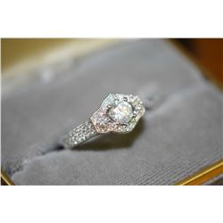 Ladies brand new platinum and diamond ring set wtih round brilliant 0.70ct center diamond, plus 0.85