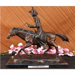 Seasoned Cowboy Riding Bronze Sculpture
