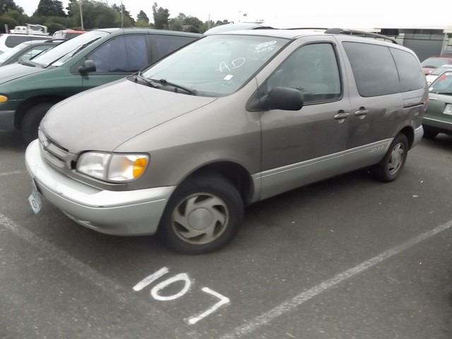 tan toyota minivan