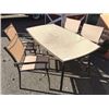 Image 1 : PATIO TABLE WITH WHITE GLASSTOP AND FOUR STACKING CHAIRS