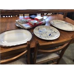 THREE ANTIQUE SERVING PLATTERS AND PLACEMATS AND SILVER PLATE TRAY