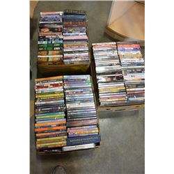 THREE BOXES OF DVDS