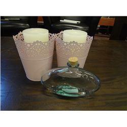 Light pink tin with candle inside