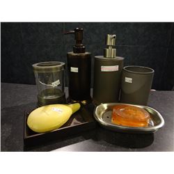 Group of bathroom accessories Soap dispenser, cups, soap dish