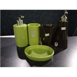 Group of bathroom accessories Soap dispenser, cups, soap dish