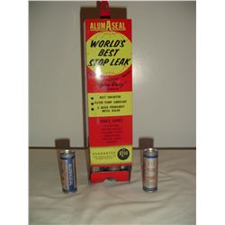 1966 N.O.S. alumaseal service station display holder with product