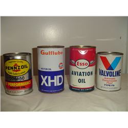 4 different 1 qt oil tins some full