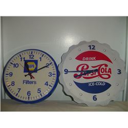 2 advertising clocks pepsi (battery) and napa (plug in)