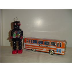 2 tin toys robot and bus
