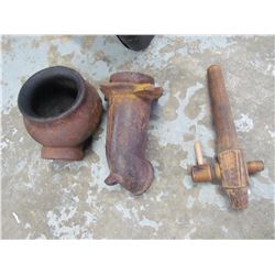 2 well pump accessories and 1 Wooden spiggett