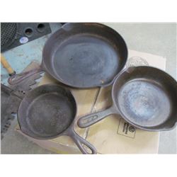 3 cast iron pots