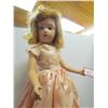 Image 5 : 18 inch tall vintage doll in peach dress on stand