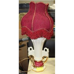 VINTAGE LAMP WITH RED SHADE.
