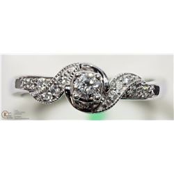 30) 10K WHITE GOLD DIAMOND TWIST RING
