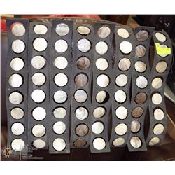 METAL AND SHELL WALL HANGING.