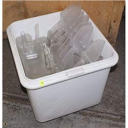 ROLLING DRY GOODS BIN FULL OF LARGE PLASTIC SCOOPS
