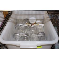 TOTE OF GLASS SUGAR DISPENSERS & MEASURING CUPS